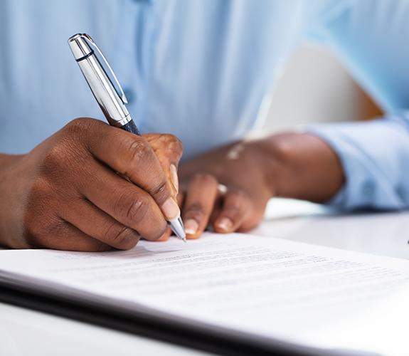 Man filling out paperwork