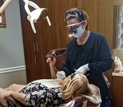 Doctor D treating a dental patient