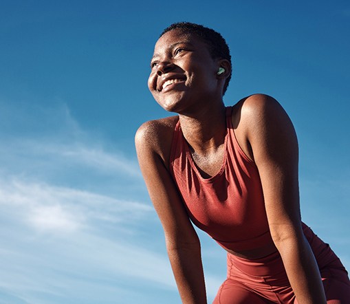 Lady smiles outdoors