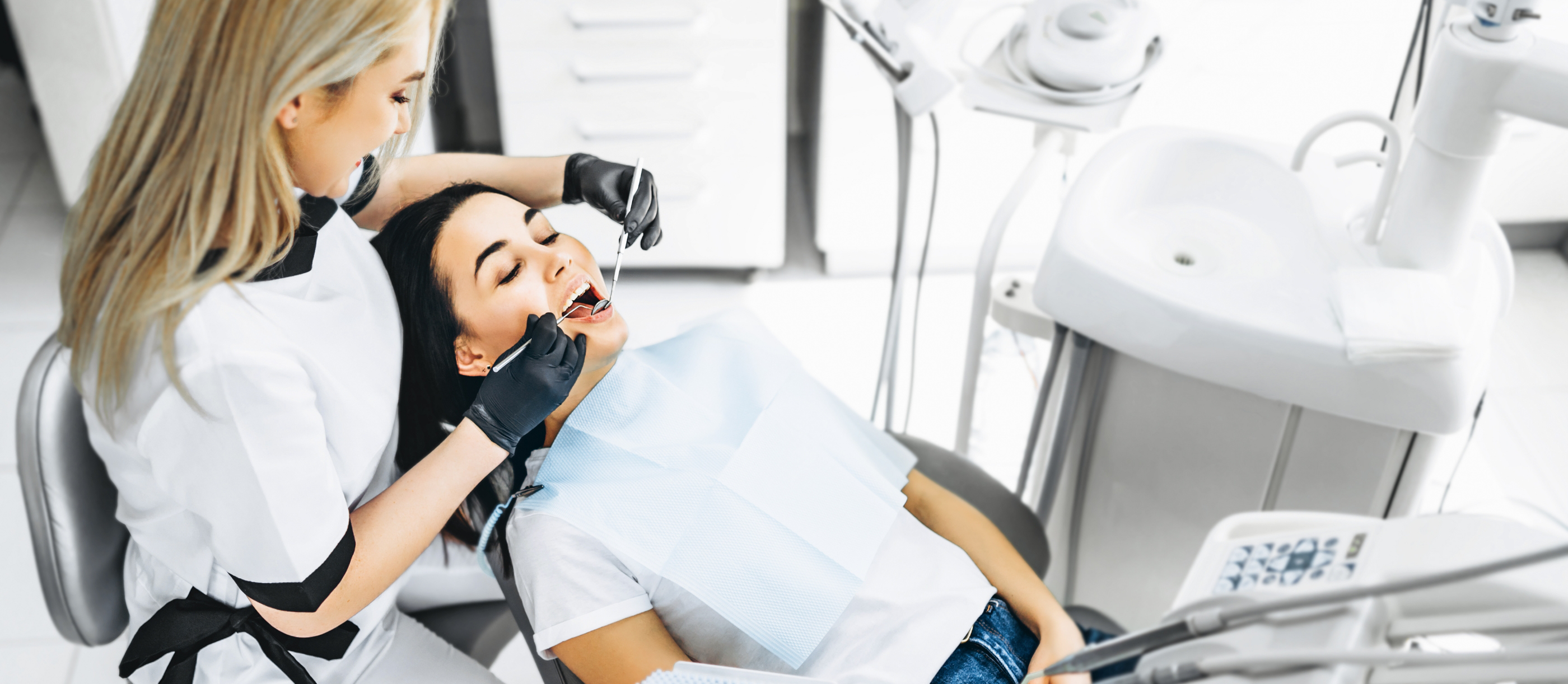 Woman receiving a preventive dentistry checkup