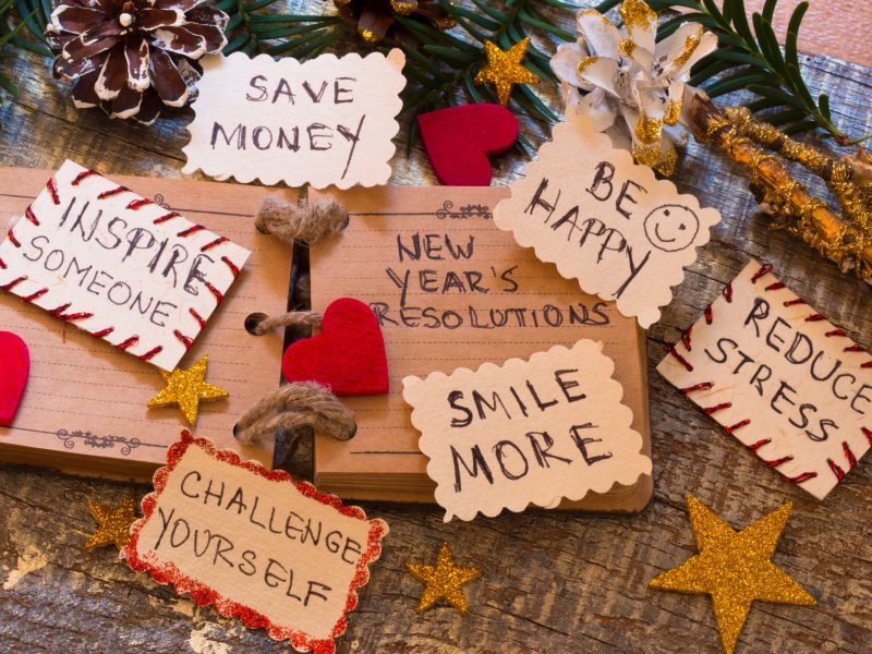 Patient some New Year’s resolutions for oral health written out